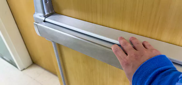 Installing a Push Bar on a Door Rock Island